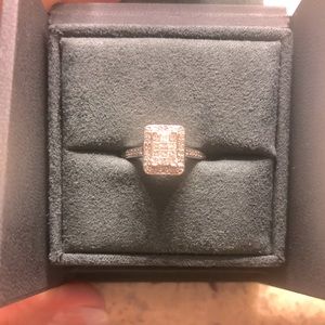 Woman’s diamond ring.